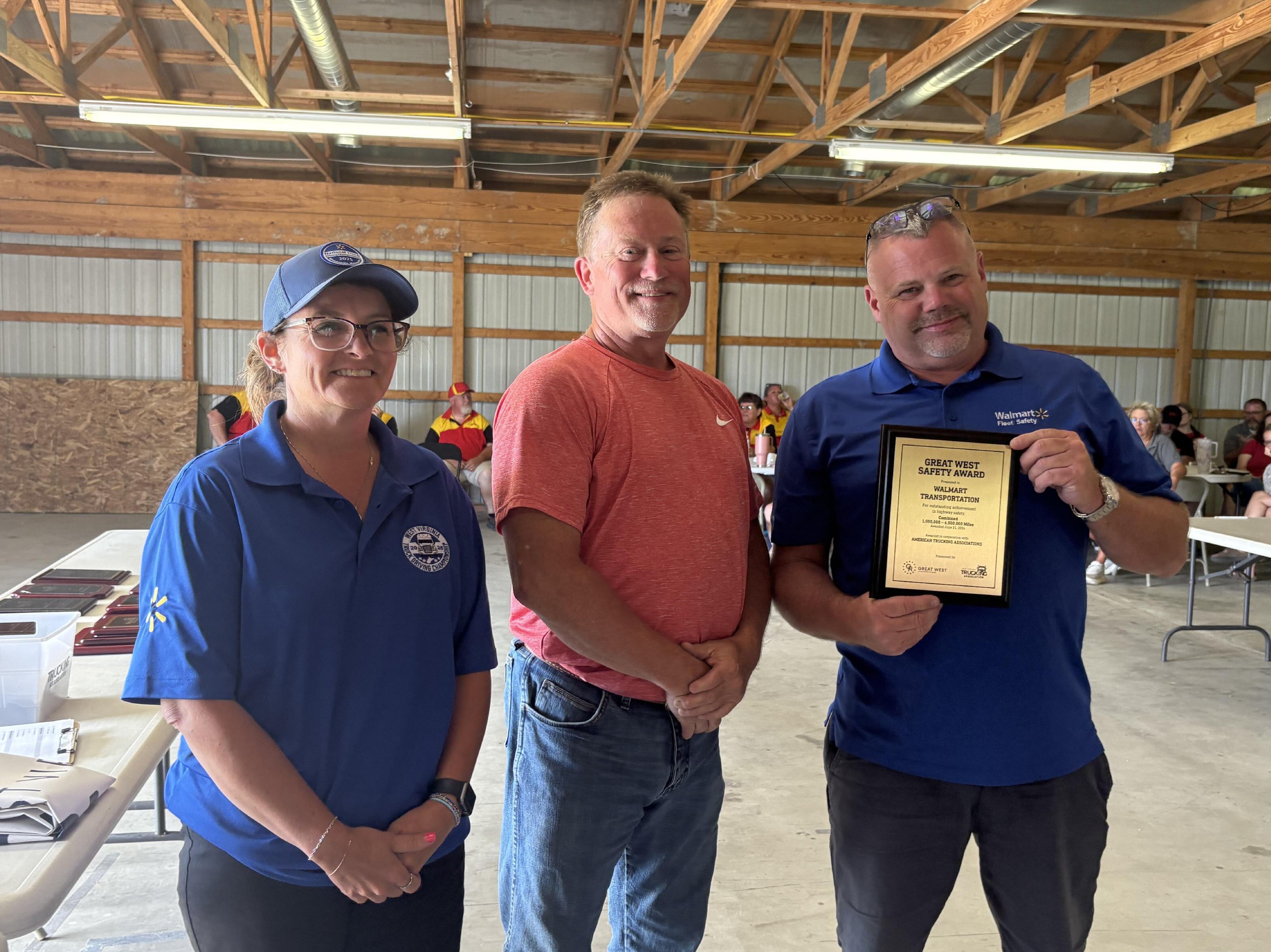 Walmart Transportation accepting the Great West Safety Award